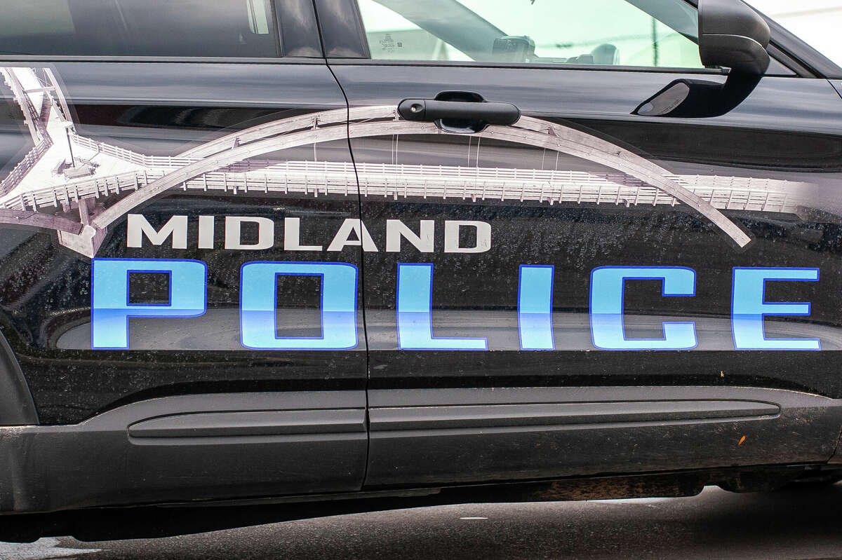 The Midland police and fire departments respond to a vehicle crash on Oct. 12, 2022 in the area of South Saginaw Road and Rodd Street.
