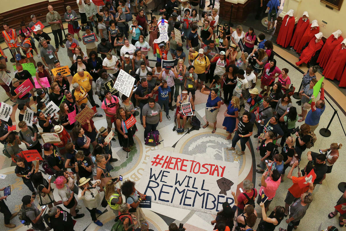 A diverse group of organizations and individuals gather for the "Resistance Rally and Day of Action" in the rotunda of the state capitol, Tuesday, July 18, 2017. A 30-day Special Session of the Texas legislature started on Tuesday. Texas Gov. Greg Abbott, with the support of Lt. Gov. Dan Patrick, who presides over the Senate, is pushing an agenda that include automatic property tax rollback elections if cities and counties raise revenue over a certain rate and preventing transgender people from using restrooms in public buildings - or at least schools - that align with their gender identity.