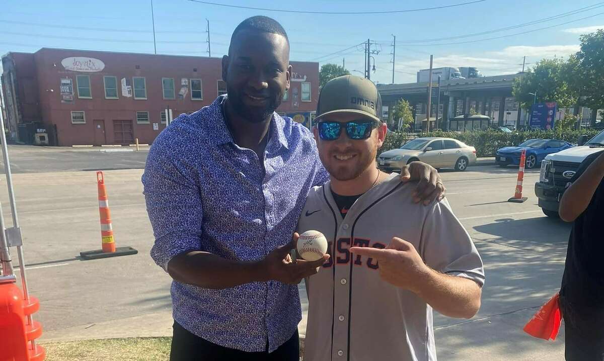 Dillon Harrell met Yordan Alvarez before Game 2 of the American League Division Series at Minute Maid Park on Thursday, Oct. 13, 2022 after catching the Astros slugger's walkoff home run in Game 1.