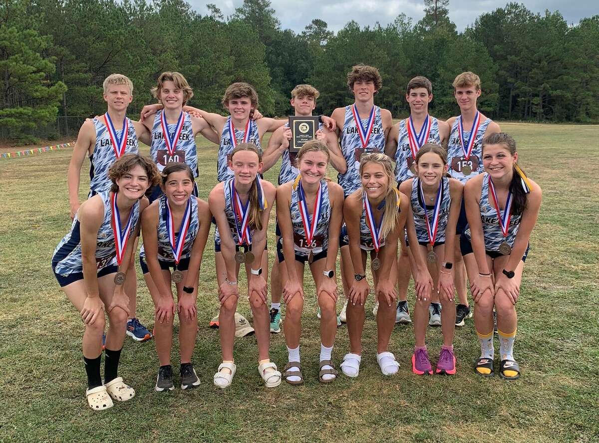 The Lake Creek boys and girls cross country teams pose for a photo after the District 21-5A meet on Oct. 13, 2022 at Magnolia High School in Magnolia.