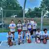 * The Gray Team, the champions of the West Haven Department of Parks and Recreation’s Girls Summer Fun Basketball League, show their trophies at the Veterans Memorial Park courts on Bull Hill Lane on Aug. 22. Front row, from left, are Aria Cannon Perry, Emily Palma, Payton Oliverio, Gabriella Jeune and Taliah Boykin. Back row, from left, are Savahna Neieves, Luna Montanez, Maria Valentina Muriel, Jastice Butler, Amayia Ortiz and coach Jared Butler. The team defeated the Gold Team 26-24 in overtime and finished the season 7-1. The league, supervised by Park-Rec program coordinator Brian Hayden, just capped its 22nd season. (City Photo/Brian Hayden)