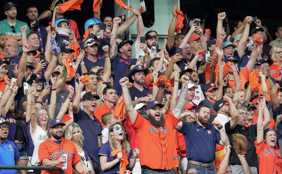Houston Astros fans react to winning Game 2 of American League Division Series against the Seattle Mariners Thursday, Oct. 13, 2022, at Minute Maid Park in Houston.