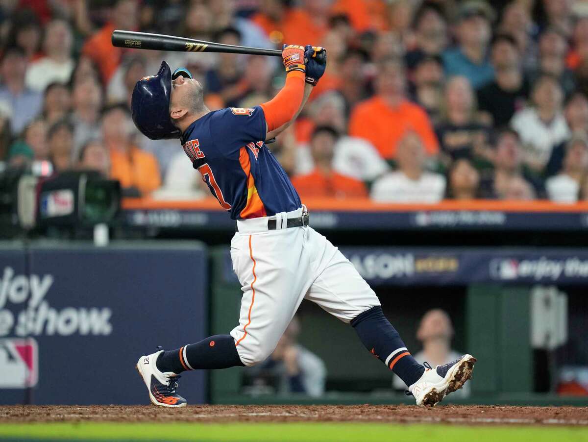 Jose Altuve hits a pop fly in the sixth inning of the Astros' Game 2 ALDS win over the Mariners. His hitless slump in the first two games of the ALDS is a first in his seven-year postseason career. 