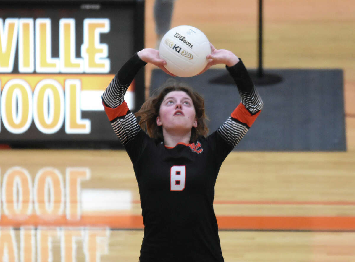 Edwardsville's Sara Gouy with a pass against East St. Louis on Thursday inside Lucco-Jackson Gymnasium in Edwardsville.