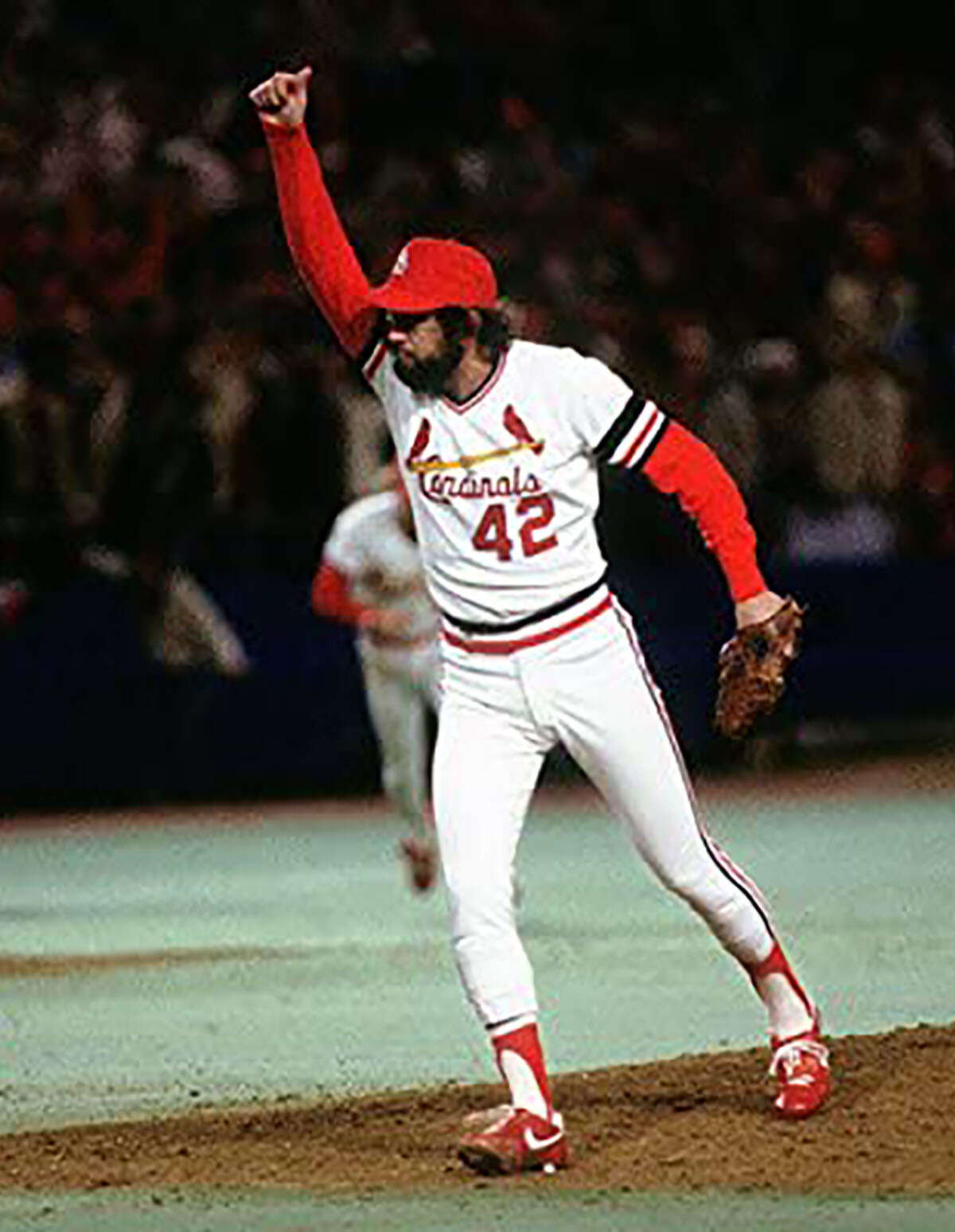 Former Cardinals reliever and Hall of Famer Bruce Sutter died Thursday night at the age of 69. He is shown celebrating the Cardinals winning Game 7 of the 1982 World Series against the Milwaukee Brewers at Busch Stadium II.