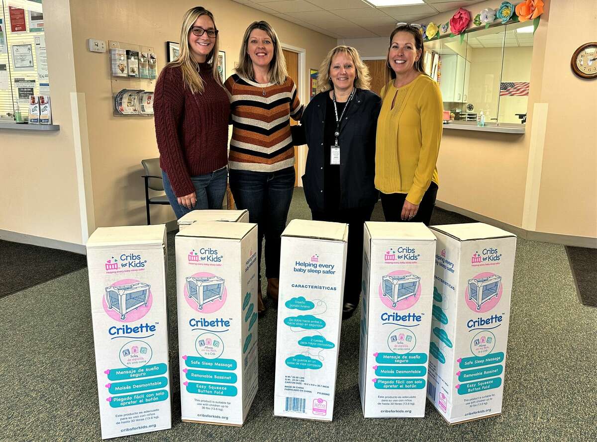 The Lakeshore Children's Advocacy Center donated safe sleep resources to District Health Department #10 in recognition of Infant Safe Sleep Awareness Month. Pictured are Chelsea Medacco (left) and Traci Smith, of the advocacy center; Rebecca Fink, DHD #10 Maternal and Infant Health Program coordinator; and Megan McCarthy, executive director of the advocacy center.