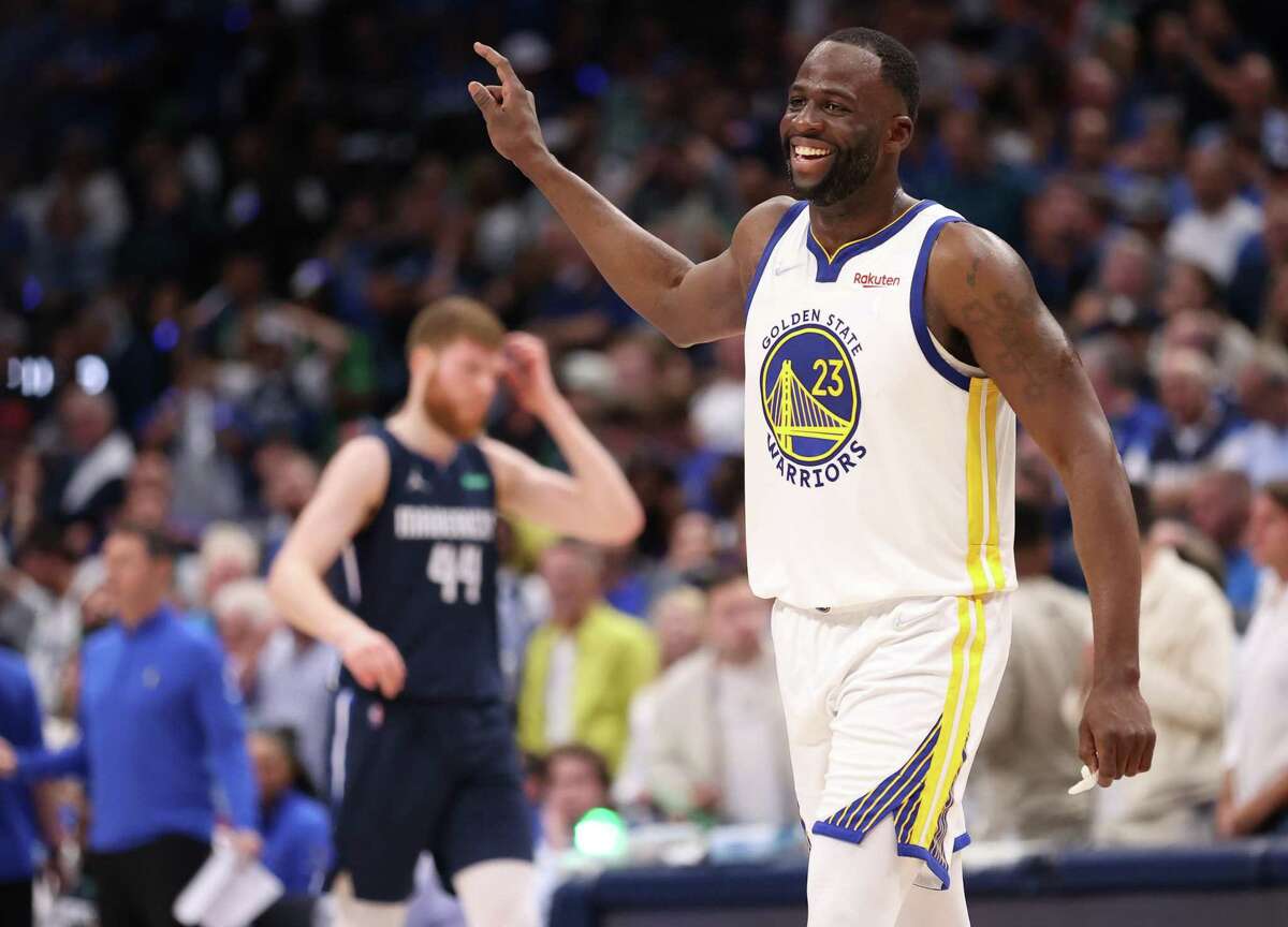 Golden State Warriors’ Draymond Green smiles in 4th quarter during Warriors’ 109-100 win over Dallas Mavericks in Game 3 of NBA Western Conference Finals at American Airlines Center in Dallas, Texas, on Sunday, May 22, 2022.