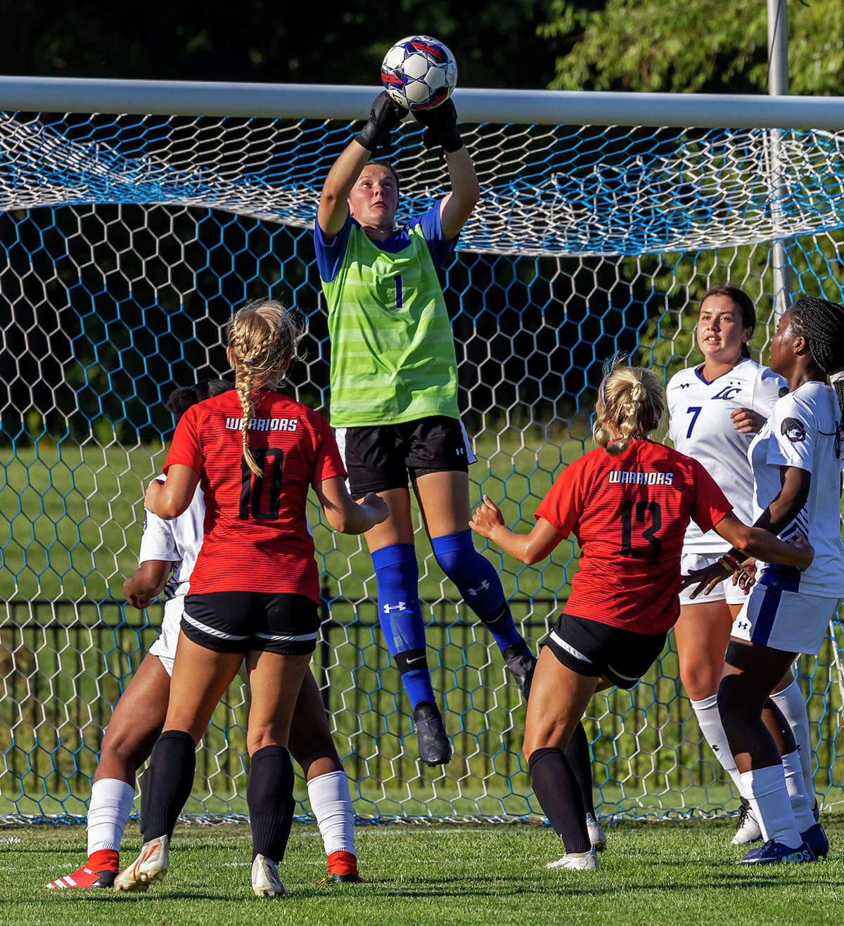 LCCC goalie Kendall Chigas goes high to corral a save against Wabash Valley College this season