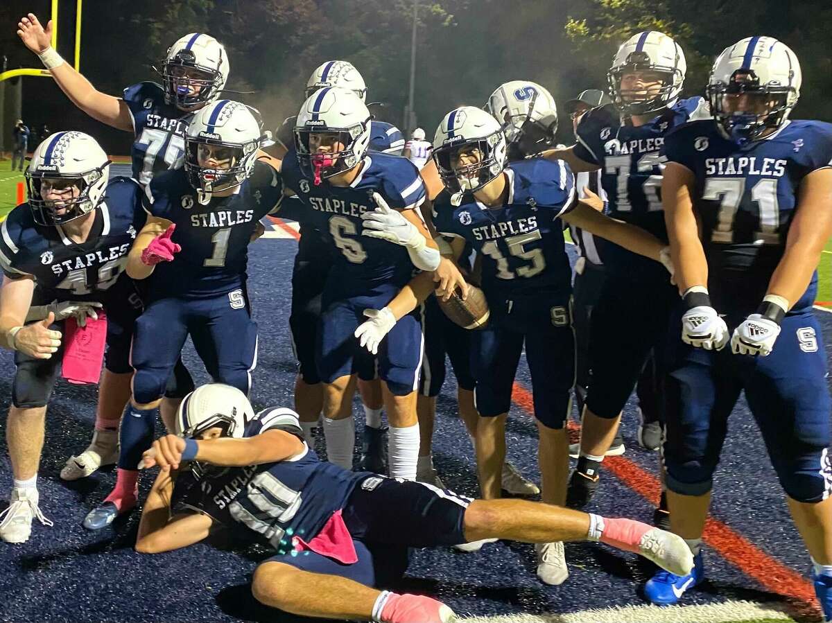 Staples beats Danbury in FCIAC football game