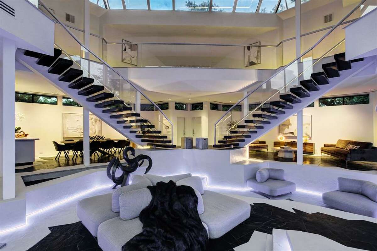 Custom lighting illuminates the living room