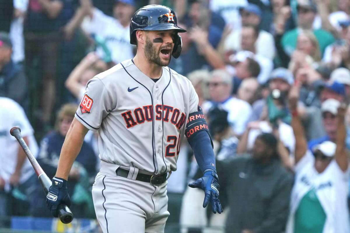Houston Astros' Chas McCormick (20) reacts after striking out with runners on to end the top of the second inning of Game 3 of the American League Division Series against the Seattle Mariners on Saturday, Oct. 15, 2022, in Seattle.