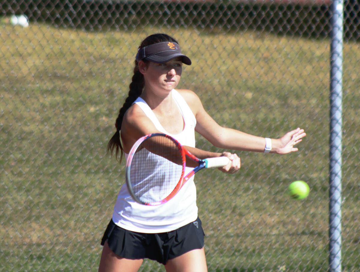 Sophie Byron in action at the Class 2A Edwardsville Sectional on Saturday at the EHS Tennis Center. Sophie and her doubles partner and sister Zoe won the sectional doubles title. 