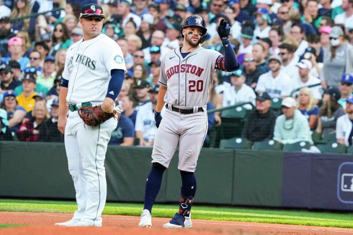 Houston Astros center fielder Chas McCormick (20) reacts toward the dugout after hitting a single during the seventh inning of Game 3 of the American League Division Series on Saturday, Oct. 15, 2022, in Seattle.