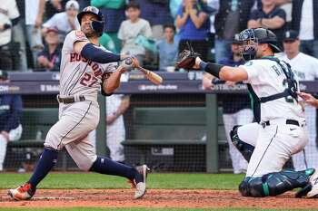 Houston Astros second baseman Jose Altuve (27) makes the throw to first  base in a game against the Colorado Rockies. The Astros defeated the  Rockies 7-5 on May 30, 2013 at Coors