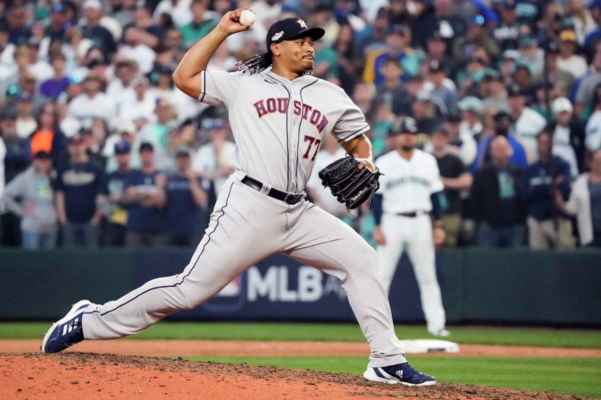 Houston Astros relief pitcher Luis Garcia pitches against the Seattle Mariners during the 14th inning of Game 3 of the American League Division Series on Saturday, Oct. 15, 2022, in Seattle.