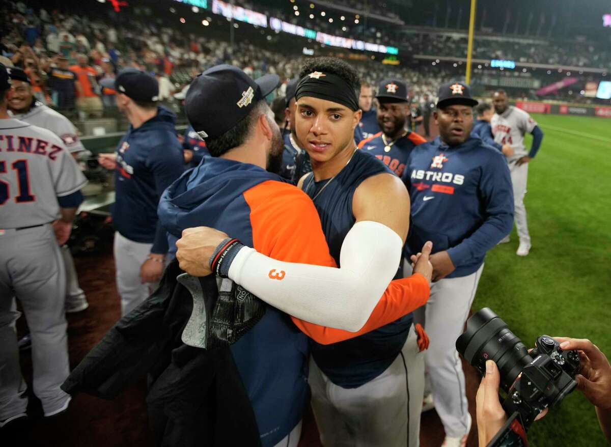 Houston Astros shortstop Jeremy Peña (3) hugs teammates after wining Game 3 of baseball’s American League Division Series at T-Mobile Park on Saturday, Oct. 15, 2022 in Seattle.