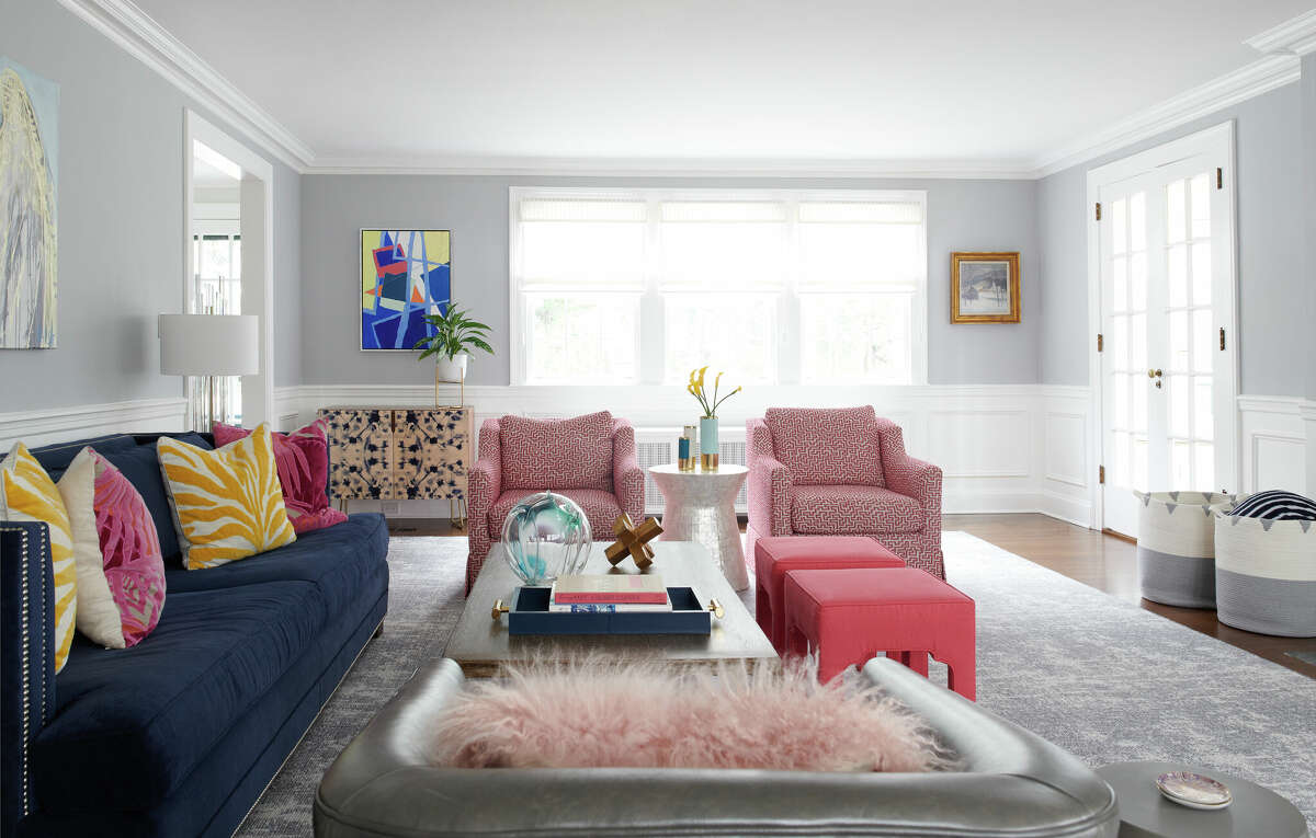 The color-splashed living room is where the large family comes to relax, play games, and simply be together. 