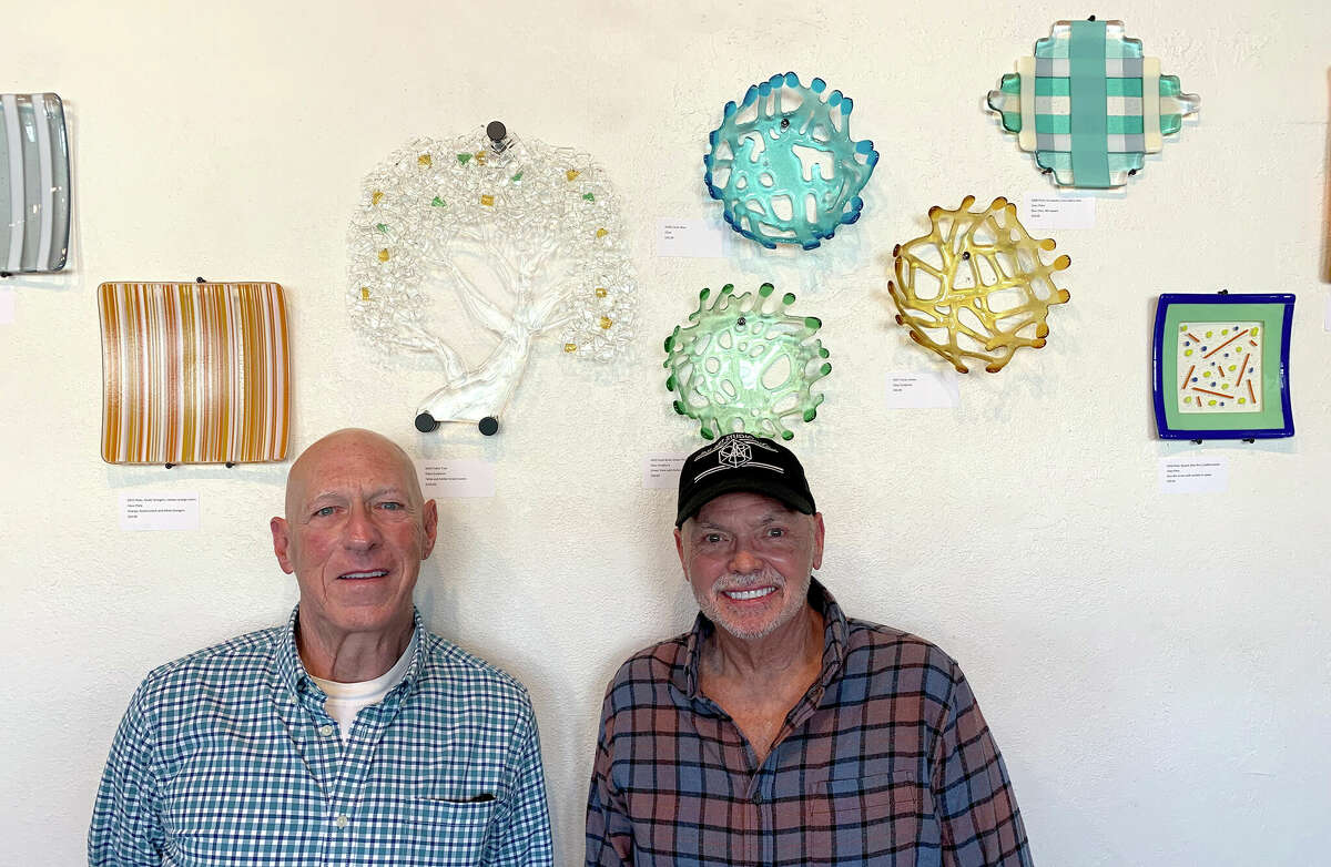Ed Esclovon, left, and Eddie Markey are showing their glass fusion artworks at The Art Studio, Inc. and Beaumont Community Players' lobby. Proceeds benefit the two non-profit organizations. Phot by Andy Coughlan