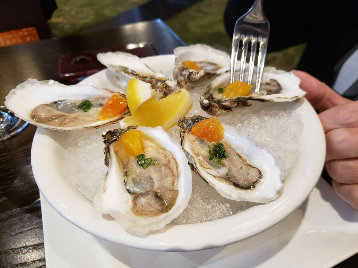 Chilled Oysters came as a complete dish with a dice of citrus, a whiff of ginger, and mignonette sauce all on the shell.