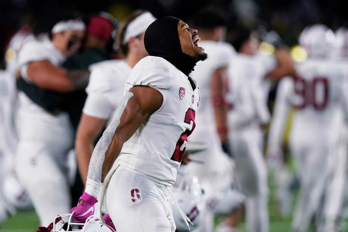 Stanford safety Jonathan McGill reacts as he runs onto the field after Stanford defeated Notre Dame 16-14 in an NCAA college football game in South Bend, Ind., Saturday, Oct. 15, 2022. (AP Photo/Nam Y. Huh)