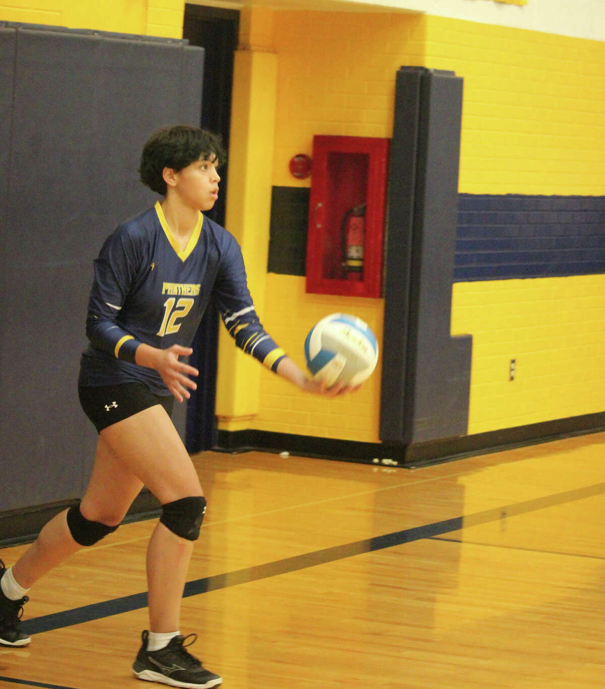 Aariona Burrell gets set to serve for Baldwin against Crossroads on Monday.