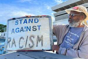 Grondahl: He held a sign to fight racism. He got racist responses.