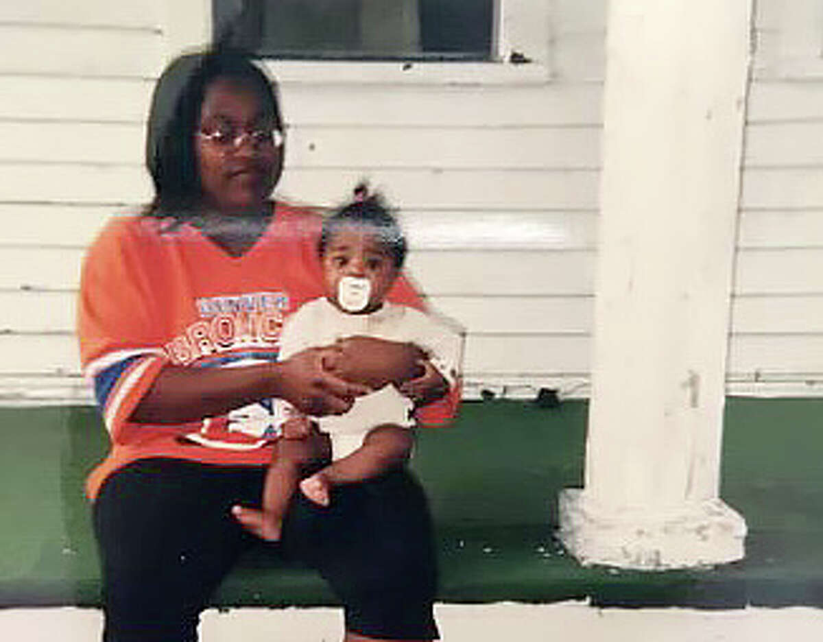 Elaine Sawyer holding her daughter Tamara Sawyer when she was a baby. Tamara was the youngest of five siblings.