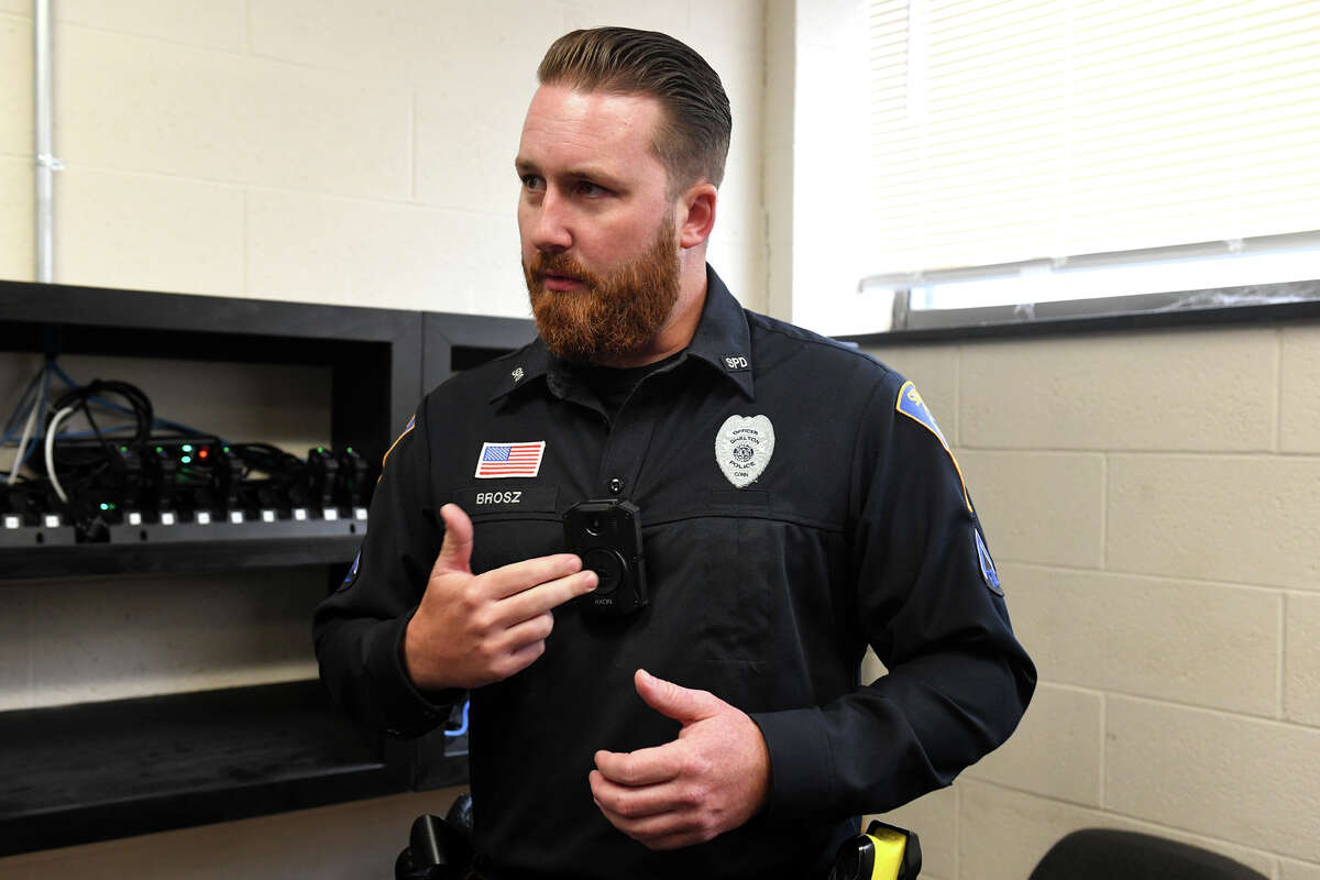 Officer Christopher Brosz speak about new police body cameras during an interview at Shelton Police headquarters, in Shelton, Conn. Oct. 18, 2022.