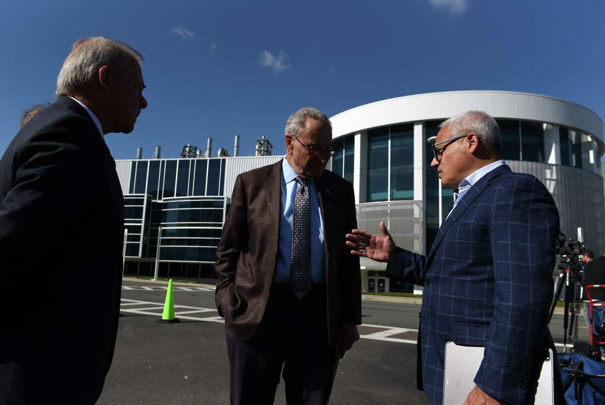 U.S. Senate Majority Leader Charles Schumer, center, speaks with Tom Caulfield, CEO of GlobalFoundries, right, and Dave Anderson, head of Albany Nanotech left, at a press conference back in October where Sen. Schumer called for legislation that would block China’s semiconductor supply from entering the U.S. defense sector and boost state chip manufacturing at Albany Nanotech. Anderson will be a guest of Schumer's at the State of the Union address Tuesday in Washington, D.C.