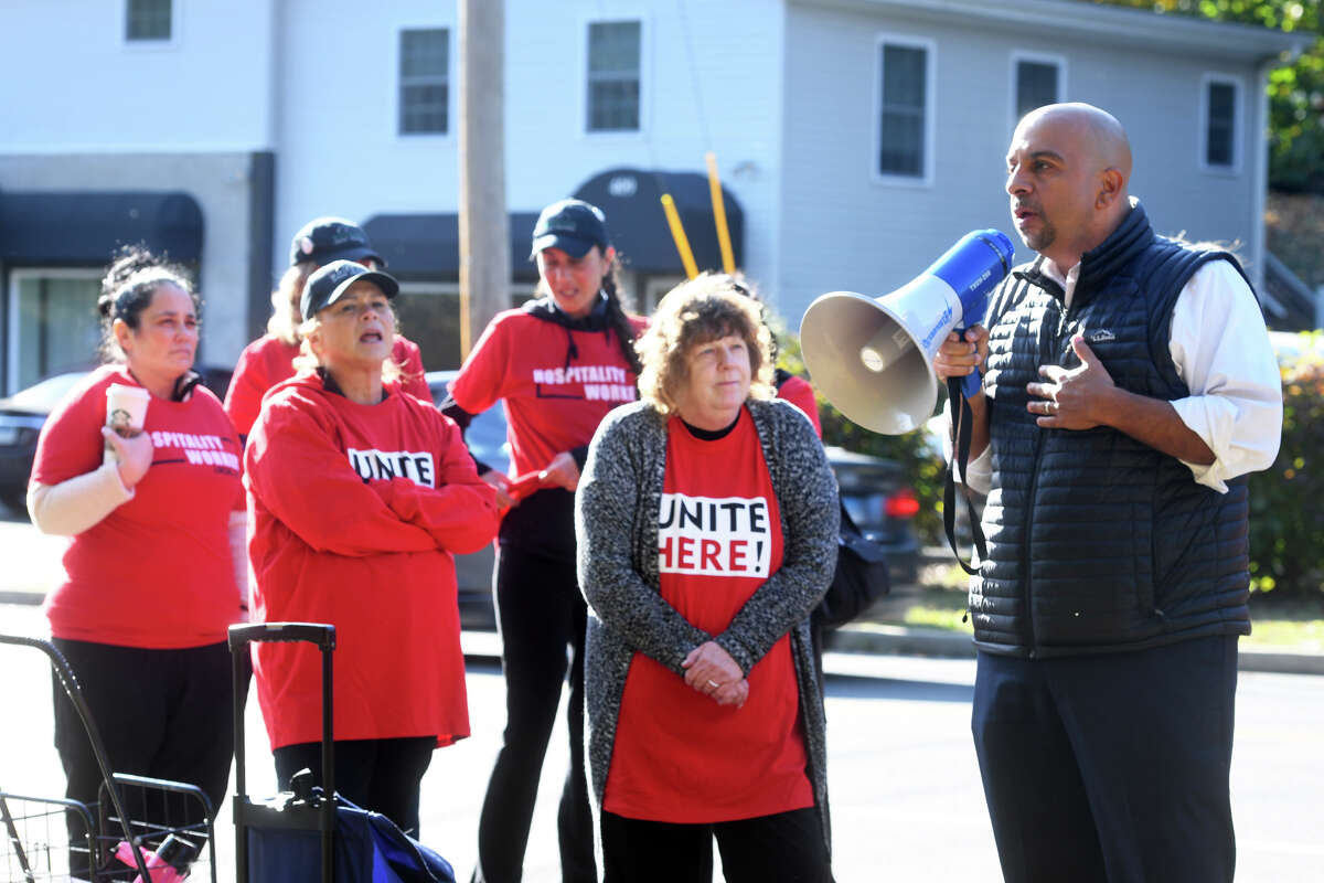 State Sen. Jorge Cabrera, of Hamden, speaks during a Unite Here Local 217 protest rally near Sunnyside Elementary School, in Shelton, Conn. Oct. 18, 2022.