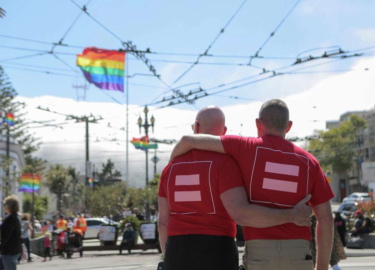 Jim Rinefierd (left) and fiance Dan Anderson share a moment in San Francisco's Castro neighborhood on Friday, June 26, 2015. Earlier in the day, the Supreme Court declared same-sex marriage legal In all 50 states.