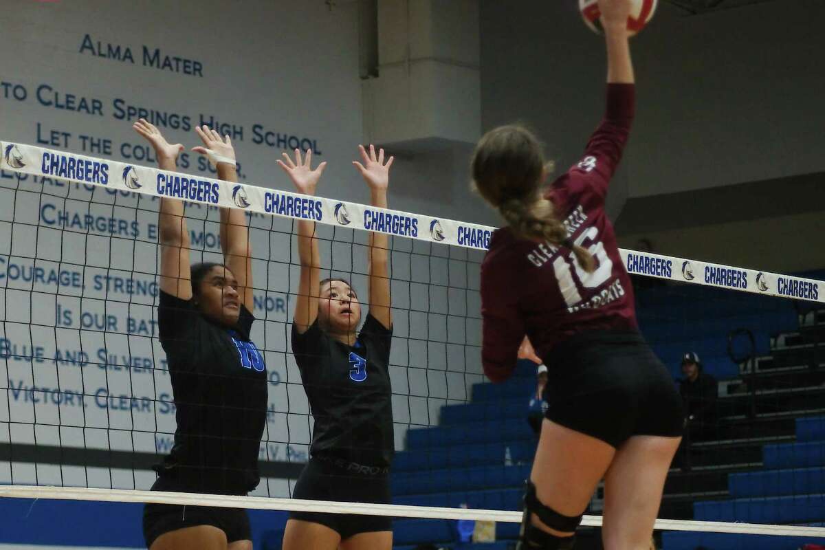 Clear Springs’ Ashley Richardson (10) and Clear Springs’ Andrea Colocado (3) try to block a shot by Clear Creek’s Stratton Sneed (16) Tuesday, Oct. 18, 2022 at Clear Springs High School.