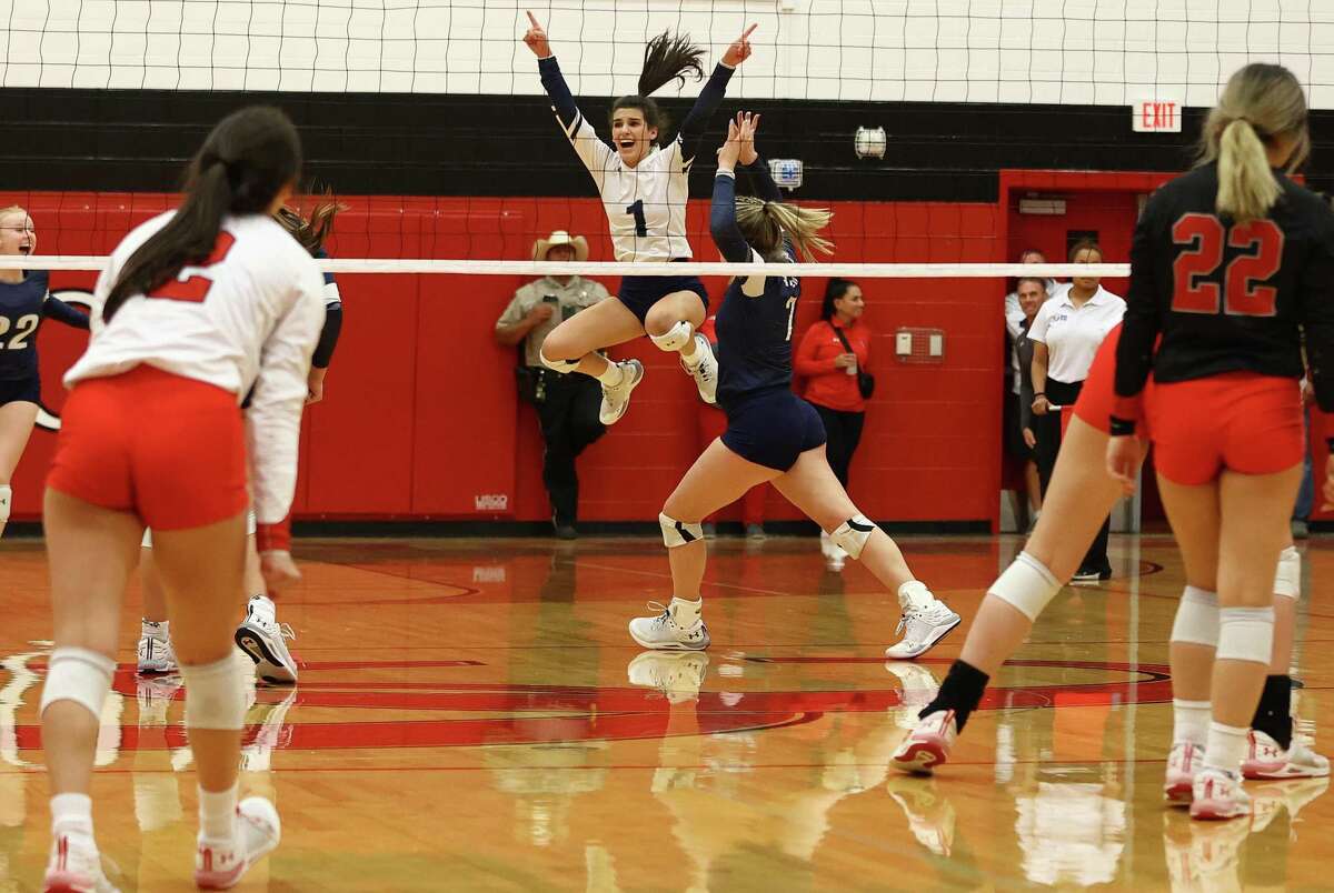 Smithson Valley’s Brittan Fedyk (01) leaps into the air after a winning point against New Braunfels Canyon during volleyball in New Braunfels on Tuesday, Oct. 18, 2022.