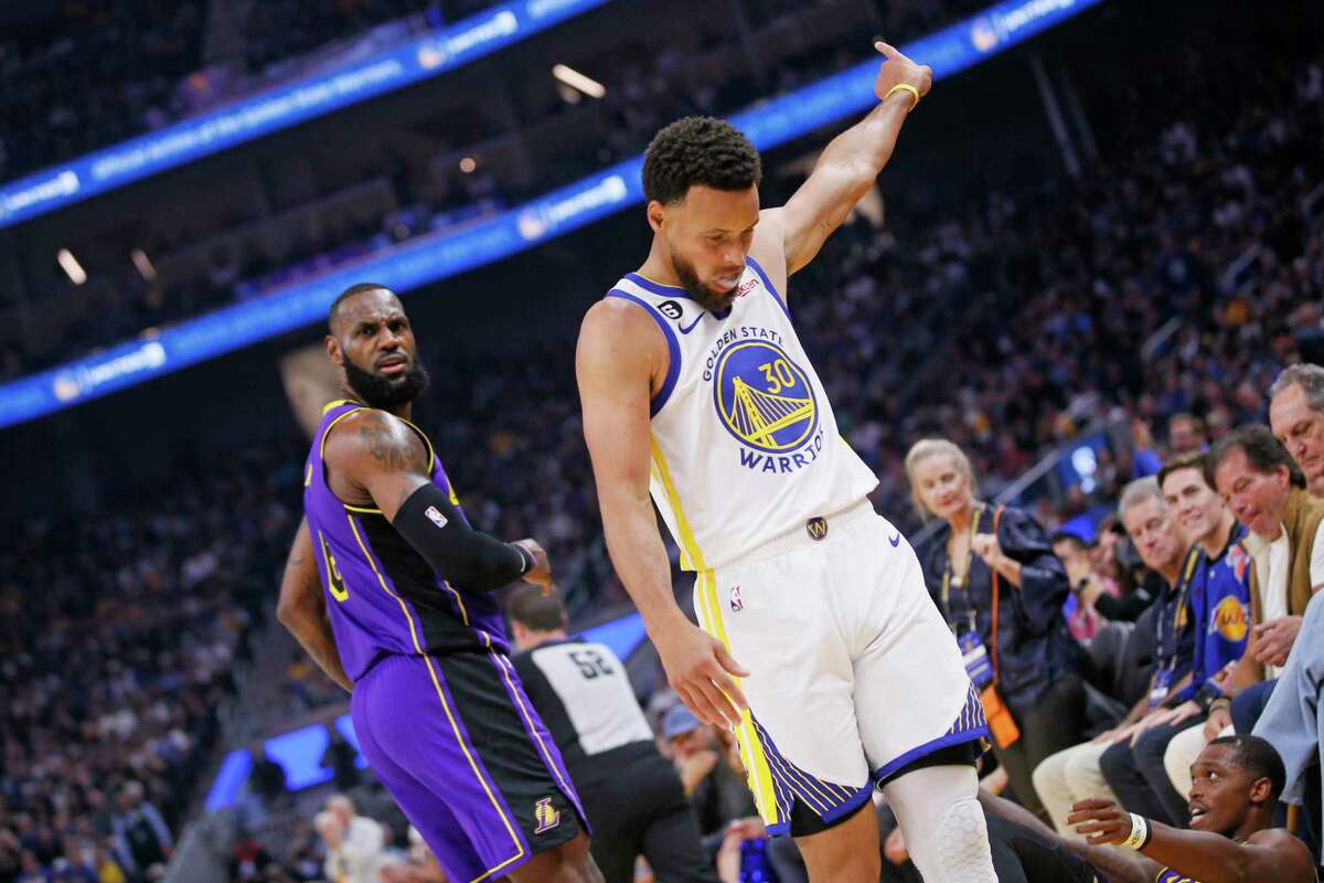 Golden State Warriors guard Stephen Curry (30) reacts after scoring and regaining possession in the Warriors’ half during the first quarter of an NBA game against the Los Angeles Lakers at Chase Center in San Francisco, Calif., Tuesday, Oct. 18, 2022.