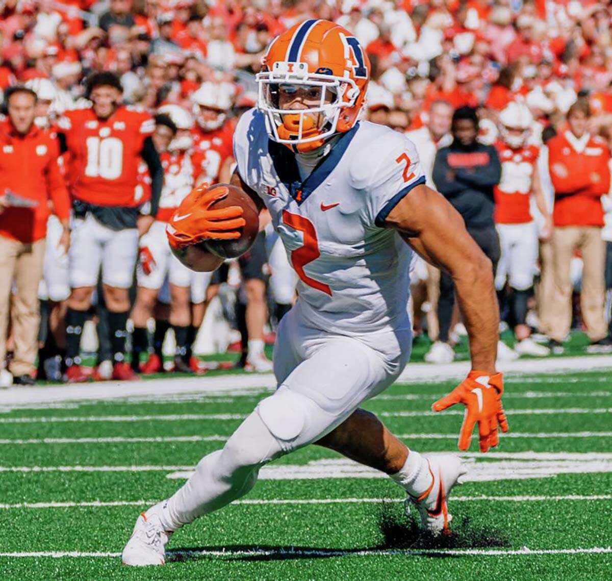 Chase Brown of Illinois enters the Illini's bye week as the national leader in rushing yards (1,059) and all-purpose yards (1,166). He has been named to three midseason All-America teams.