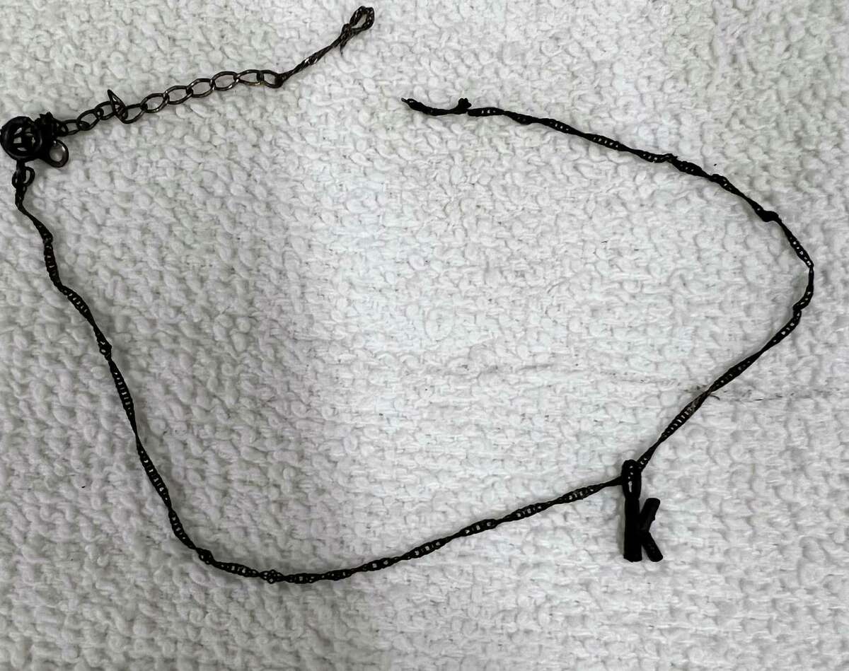 Authorities are asking for help identifying a woman who died shortly after she was found on fire on a trail in Antioch on Monday. Police said she was wearing this metal necklace with a pendant and the letter “K” attached to it, and a ring on her right ring finger.