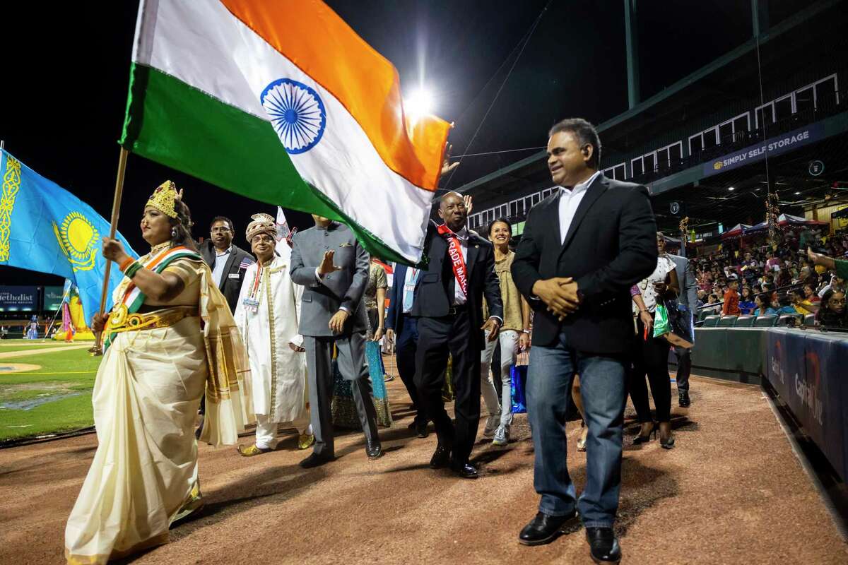 Fort Bend County Judge KP George, right, is joined by Houston Mayor Sylvester Turner during a celebration of Diwali on Saturday, Oct. 15, 2022, at Sugar Land’s Constellation Field. The parade and festival also celebrated the 75th anniversary of India’s independence.