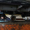 Luis Benitez welds a new catalytic converter onto a Chevrolet Silverado at Johnny Franklin's Muffler on July 11, 2022 in San Rafael, California. Thefts of catalytic converters are surging across the nation as thieves seek out precious metals like platinum, palladium and rhodium that fill the inside of the antipollution car part. Thefts have nearly tripled since the beginning of the pandemic with over 50,000 in 2021 compared to under 20,000 in 2020. Vehicle owners are having to pay thousands of dollars to replace the stolen parts and in some cases can't get the parts due to supply chain issues. 