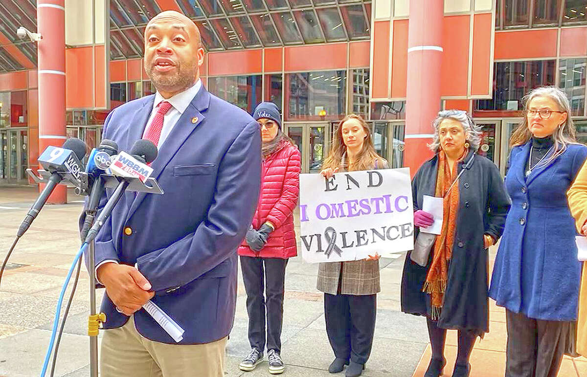 Rep. Justin Slaughter, D-Chicago, speaks at a news conference with domestic and sexual violence victim advocates and state Rep. Kelly Cassidy, D-Chicago, against a newly filed bill that would amend the SAFE-T Act criminal justice reform.