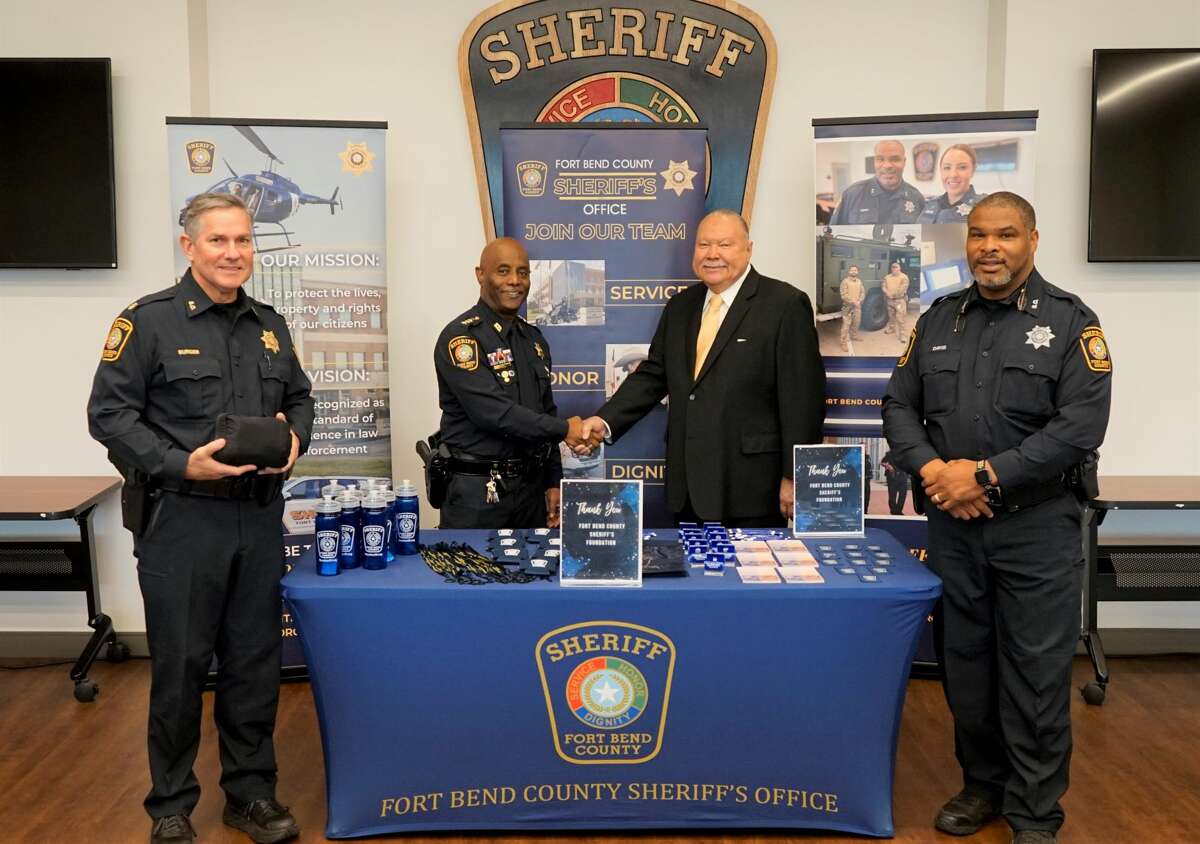 From left are Patrol Major James Burger, Sheriff Eric Fagan, Foundation Board President Dave Moss and Recruiting Deputy Frank Davis.
