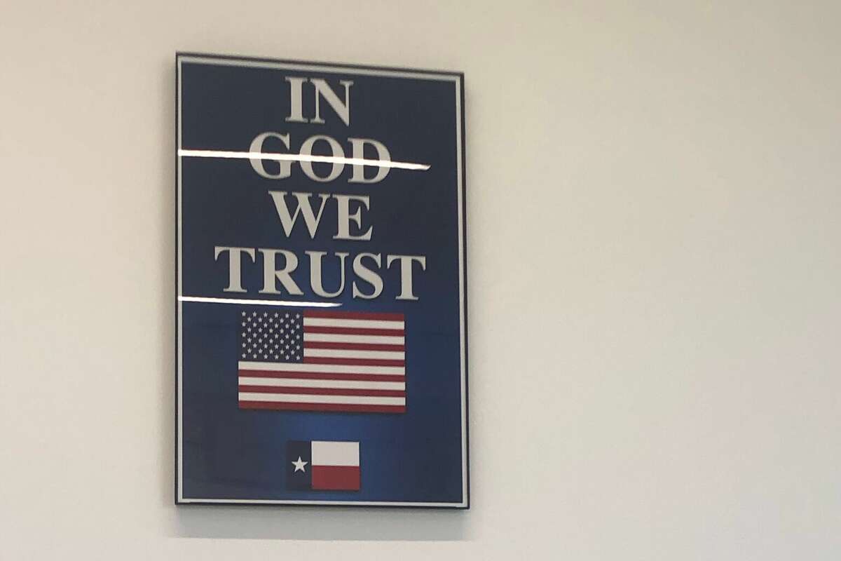 Story photo for Katy ISD displaying 73 'In God We Trust' signs donated by far-right Texas cell phone company