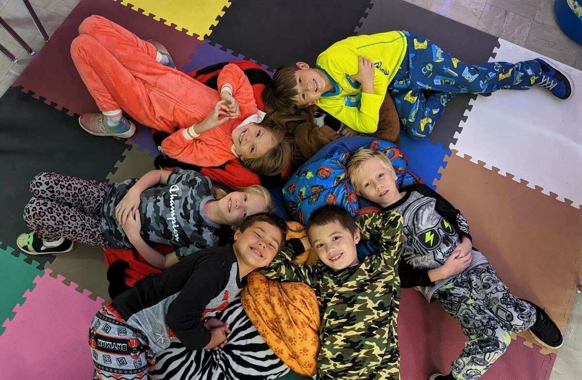 Manistee Catholic Central elementary school students enjoy Pajama Day on Monday as part of the school's week of homecoming festivities.