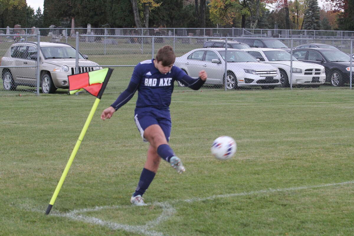 Bad Ax's Chase Sosnoski takes a corner kick.