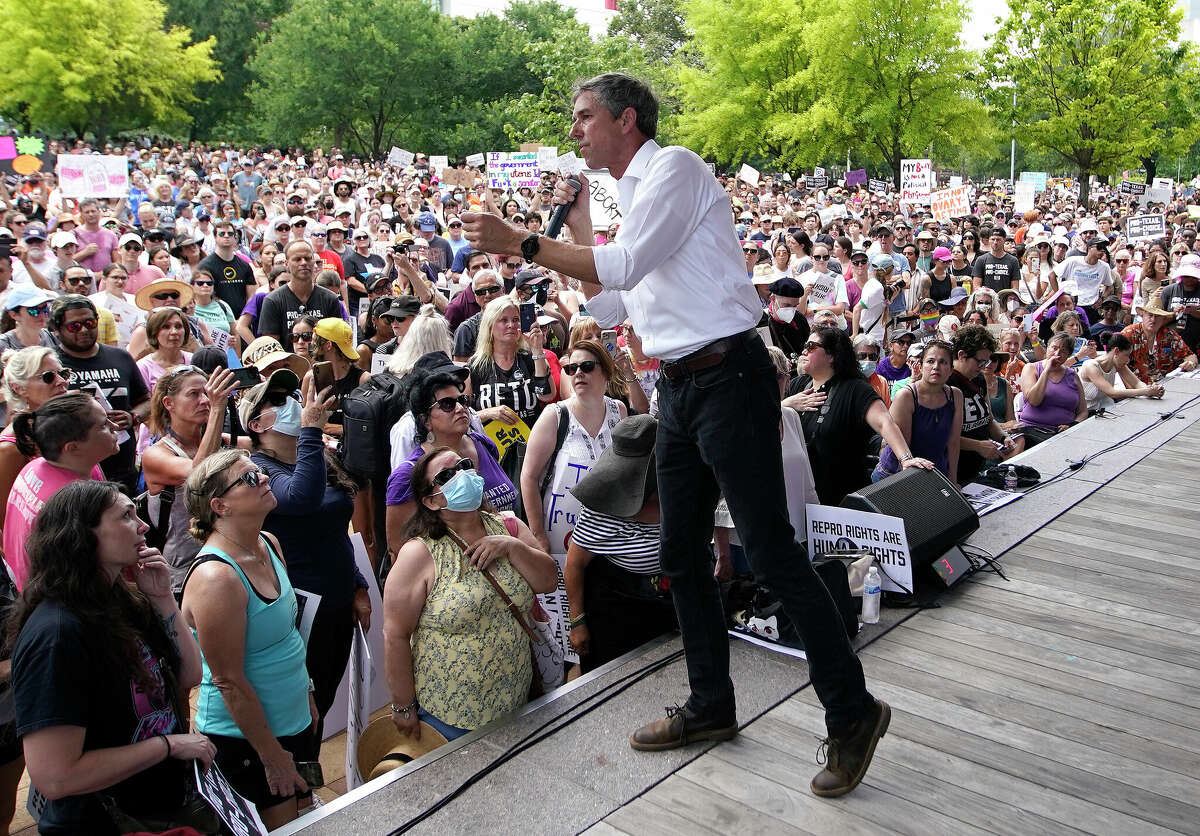 Beto Oâ€™Rourke speaks on stage in front of a large crowd during an abortion rights rally organized by Beto Oâ€™Rourke at Discovery Green on Saturday, May 7, 2022 in Houston.