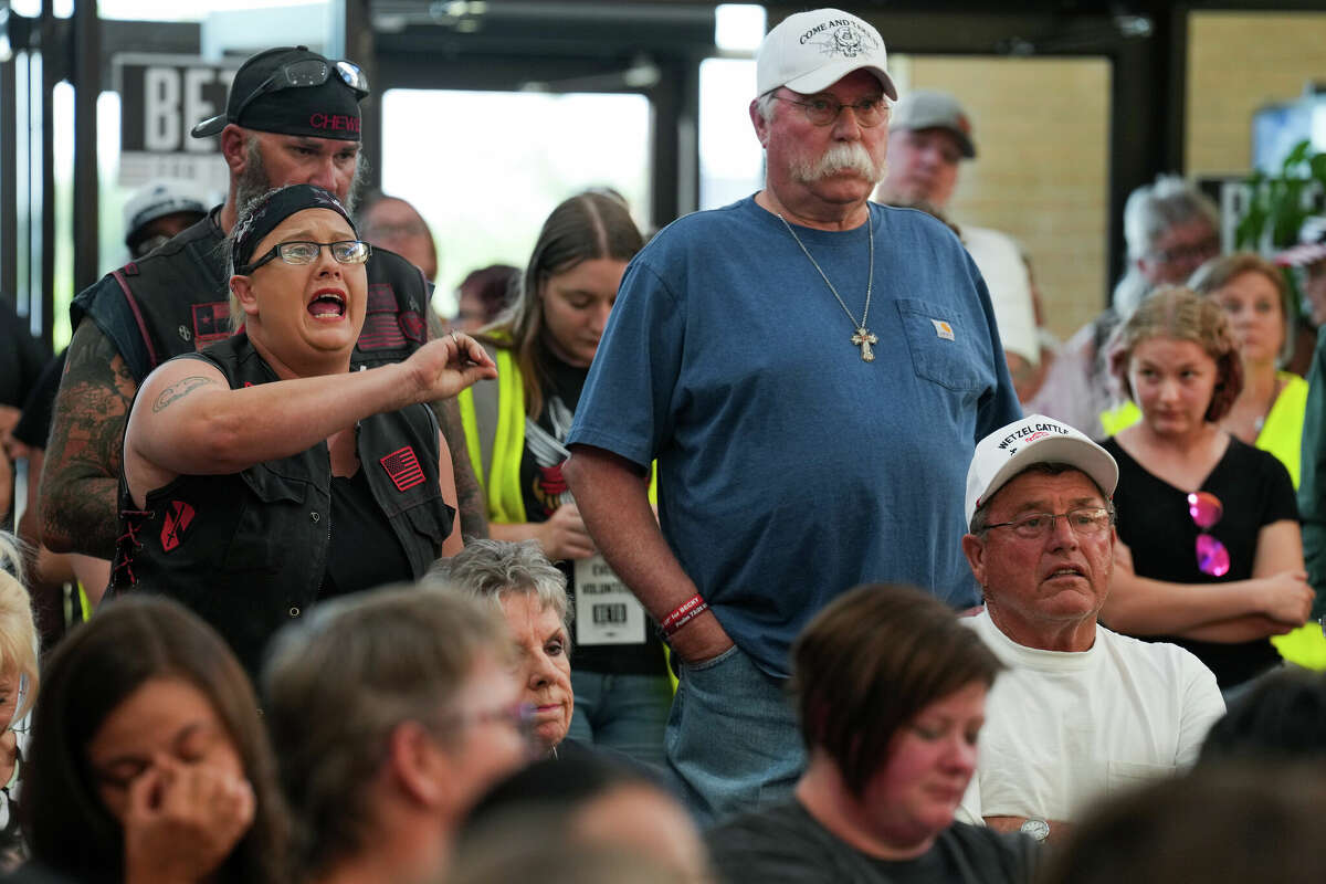 Christina Cook, left, argues against gun control while Democratic gubernatorial candidate Beto Oâ€™Rourke speaks during a town hall meeting Saturday, July 23, 2022 in Pampa. Oâ€™Rourkeâ€™s campaign is making stops throughout West Texas and the Panhandle courting voters in traditionally conservative areas of the state.