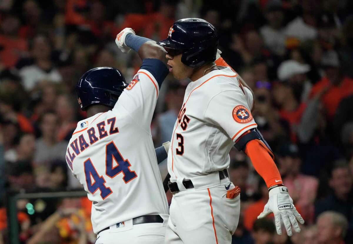 Houston Astros Jeremy Peña (3) celebrates with Yordan Alvarez (44) after hitting a solo home run off New York Yankees relief pitcher Frankie Montas in the seventh inning during Game 1 of the American League Championship Series at Minute Maid Park on Wednesday, Oct. 19, 2022, in Houston.