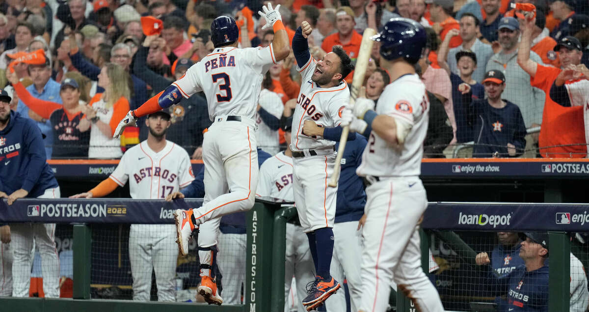 Houston Astros Jeremy Pena (3) celebrates with Jose Altuve (27) after hitting a solo home run off New York Yankees relief pitcher Frankie Montas in the seventh inning during Game 1 of the American League Championship Series at Minute Maid Park on Wednesday, Oct. 19, 2022, in Houston.