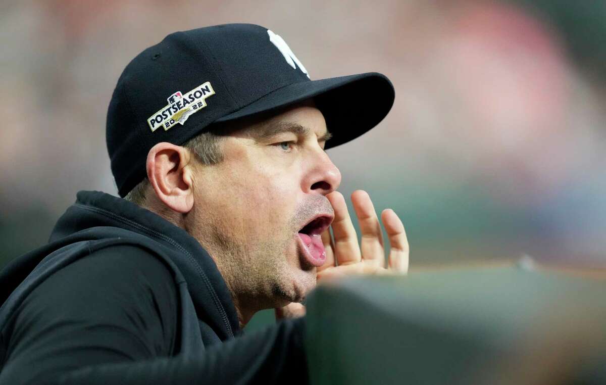 New York Yankees manager Aaron Boone (17) argues with an umpire as New York Yankees center fielder Aaron Judge bats during the eighth inning of Game 1 of the American League Championship Series at Minute Maid Park on Wednesday, Oct. 19, 2022, in Houston.