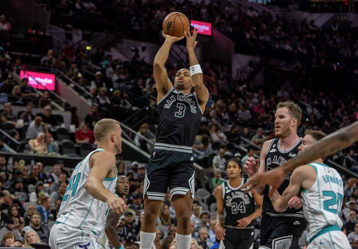 San Antonio Spurs forward Keldon Johnson shoots Wednesday night, Oct. 19, 2022, in the AT&T Center during the Spurs regular season opening night matchup against the Charlotte Hornets.