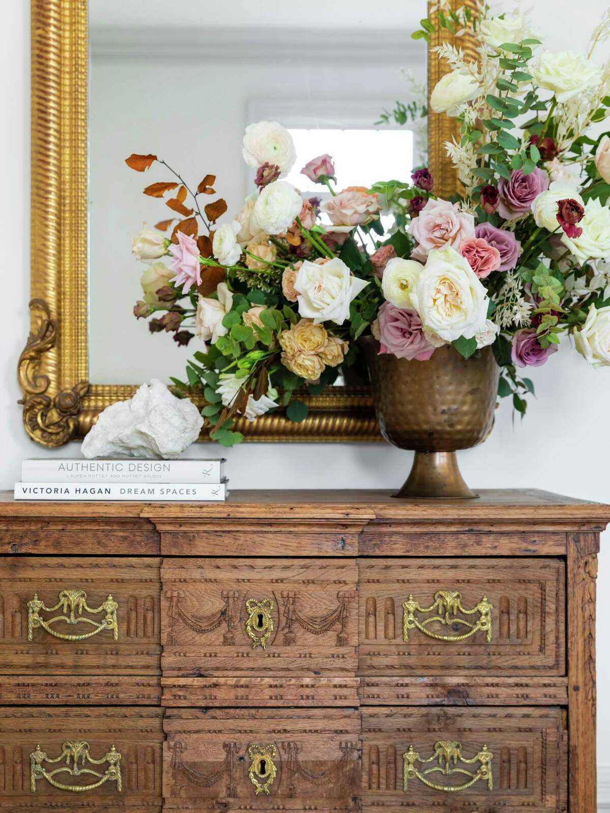 For a client's project, Houston interior designer Jana Erwin of Nest Design Group found an antique French commode at Rick Ingenthron Antiques and Interiors, an antique French mirror at Charles Hanlon Antiques and crystal pieces at Leftovers Antiques, all vendors at Blue Hills.